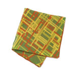 Green pocket square with orange and yellow abstract geometric pattern