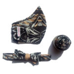 Mask, skinny bow tie, and flower. Black botanical print with grey, tan and white accents